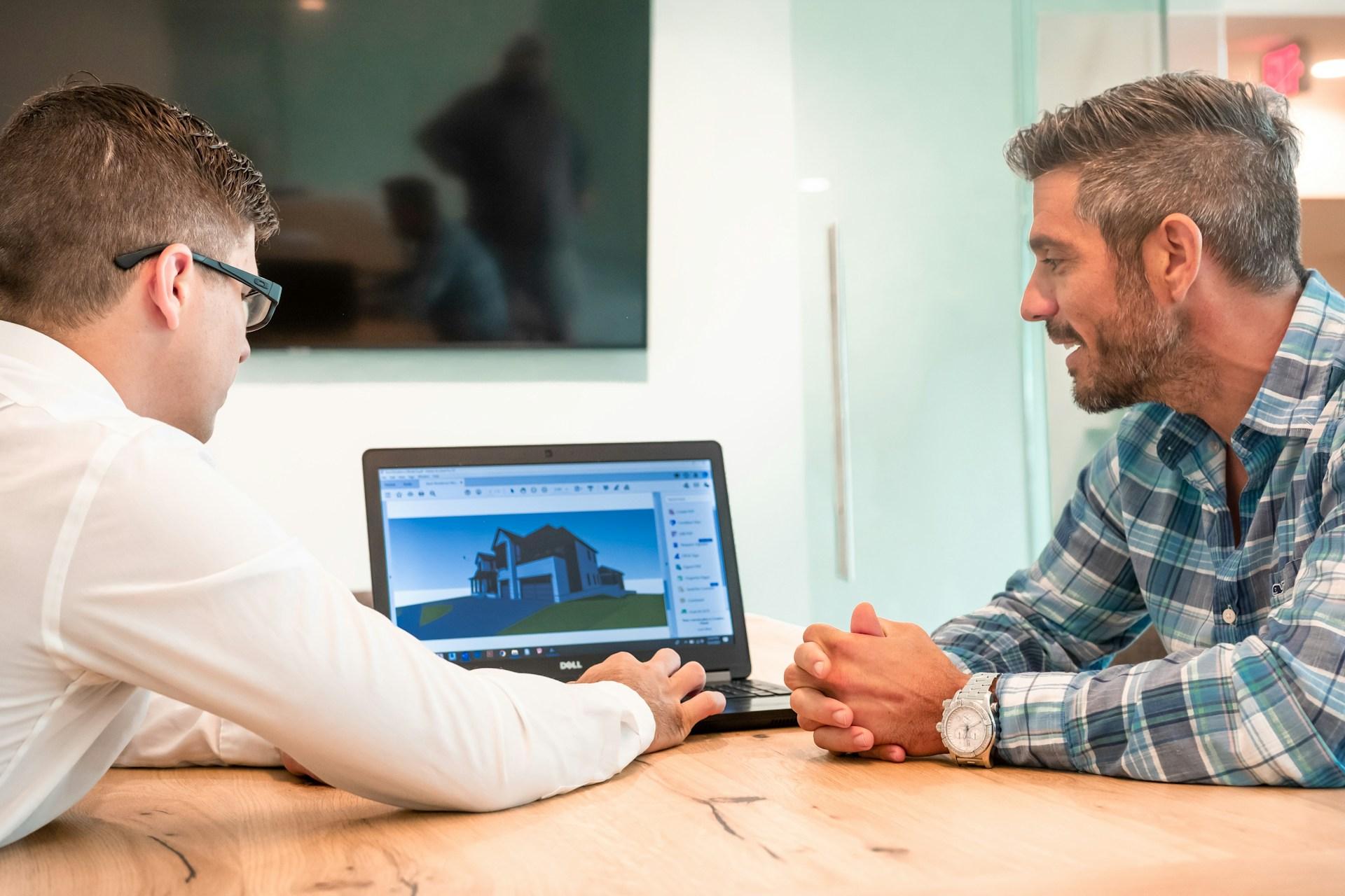 Diodato Construction owner consulting with a homeowner on renovation plans