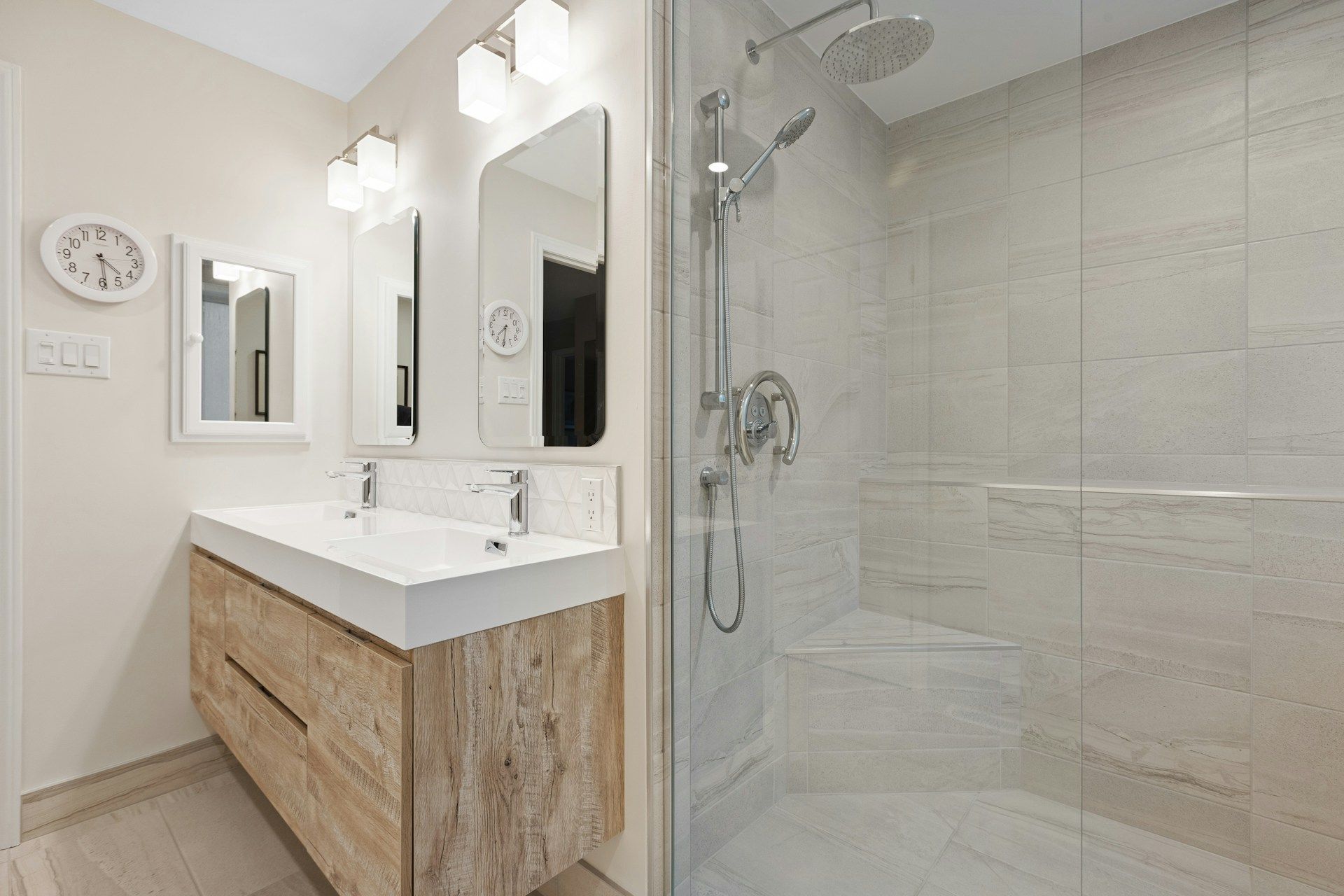 Modern bathroom remodel with double vanity and walk-in tile shower