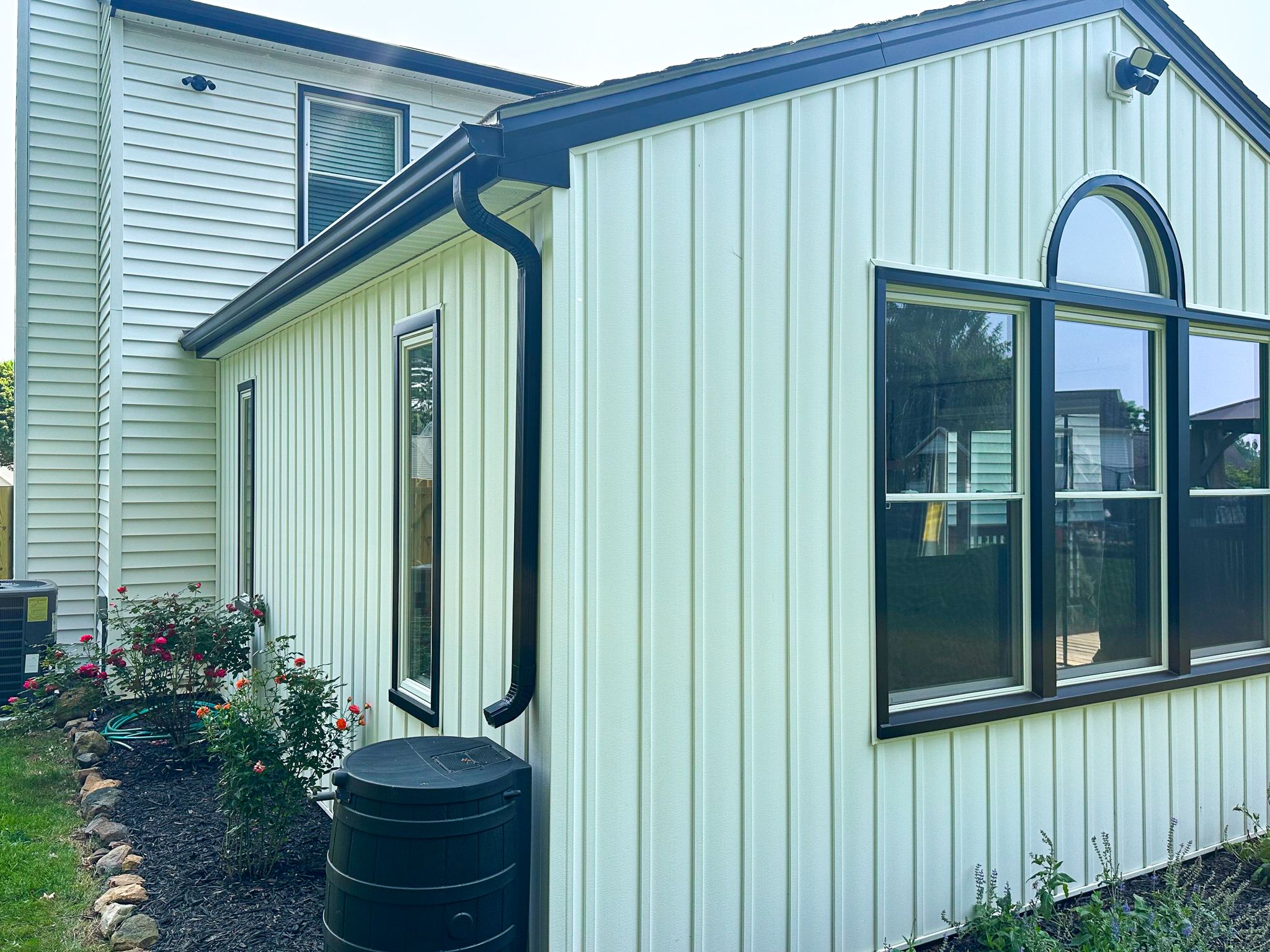New vinyl siding, windows, and gutters installation
