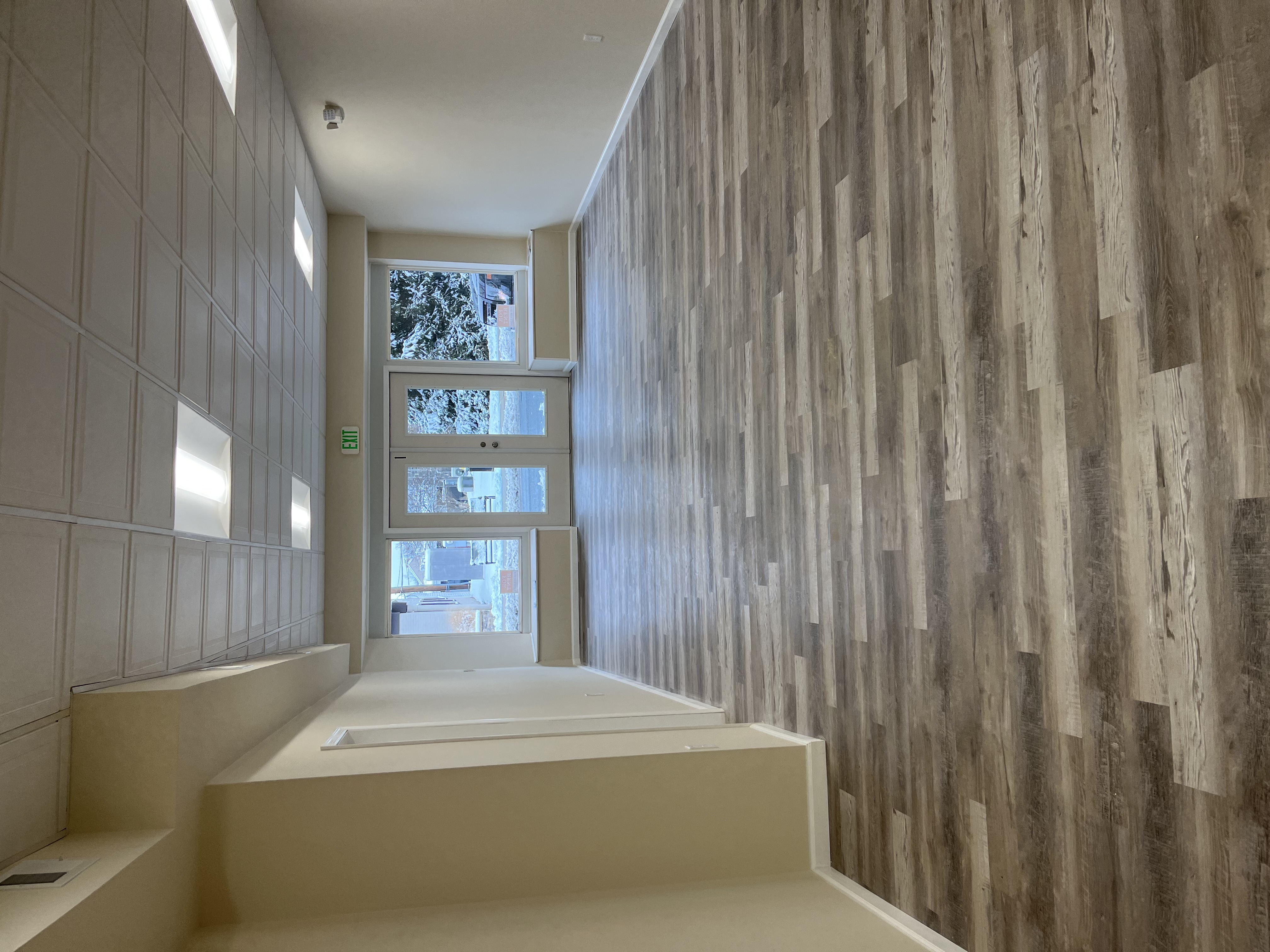 Stairwell accent wall and LVP flooring installation